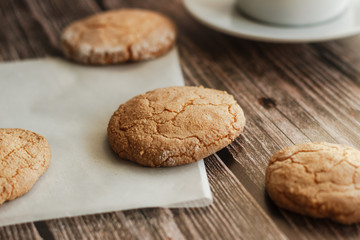 Almond cookies on the wood table. Romantic composition