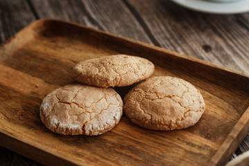 Almond cookies on the wood table. Romantic composition