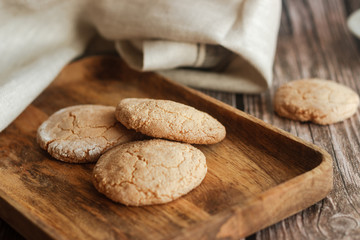 Almond cookies on the wood table. Romantic composition