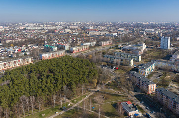 Fototapeta na wymiar Gomel. A view of the Soviet district of the city from a bird's flight. Residential buildings, neighborhoods, shops, buildings, institutions, sports facilities, roads.
