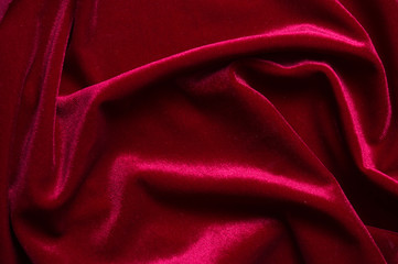 close up of Red cloth waves background texture