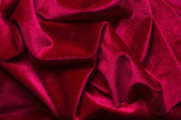 close up of Red cloth waves background texture