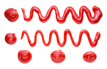 Red tomato ketchup splashes isolated on white background,