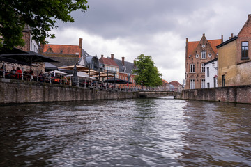 Naklejka premium Beautiful medieval city of Bruges in Belgium (Europe). Full of bridges and water channels, surrounded by fantastic buildings.