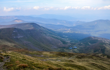 Picturesque scenic panorama view against the background of high mountain ranges blue lakes and beautiful beech forests, Svydovets ridge, Carpathian, Ukraine