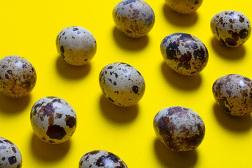 quail eggs on yellow paper, eco food trend