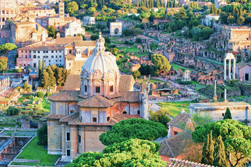 Fototapeta na wymiar Cityscape of Roman Forum and Church of Santi Luca Martina