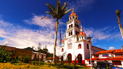 main park and traditional Colombian church