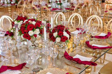Table setup with red flowers