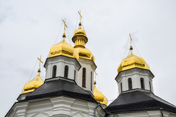 Fototapeta na wymiar Domes of St. Catherine church in Chernihiv, Ukraine - monument of the 17-th century