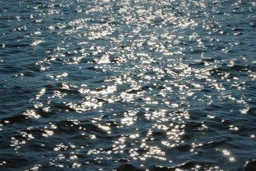 sun shining on sea surface