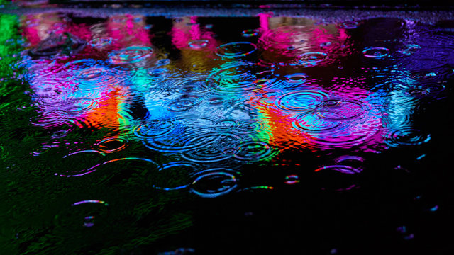 Colorful Colors As A Reflection In The Water Of A Puddle