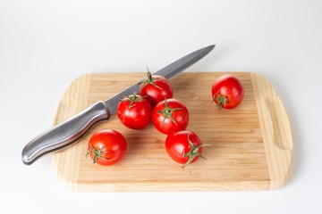 Red tomato raw ripe vegetable for food isolated on white, vitamin.