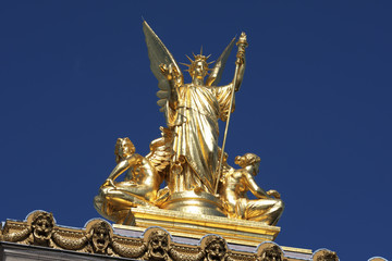 Gilded figural group Poesie atop the Palais Garnier in Paris