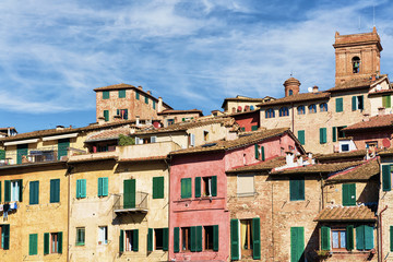Fototapeta na wymiar Colorbul buildings at old city of Siena