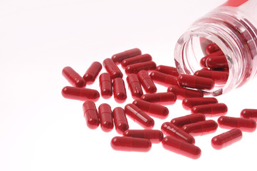 Red pills spill out of the can. Close-up. Coronavirus. Saving lives. Healthy lifestyle. Coronavirus,  covid, covid2020