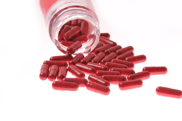 Red pills spill out of the can. Close-up. Coronavirus. Saving lives. Healthy lifestyle....