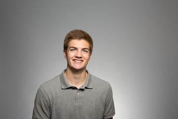 Fototapeta premium Studio portrait of an excited young man