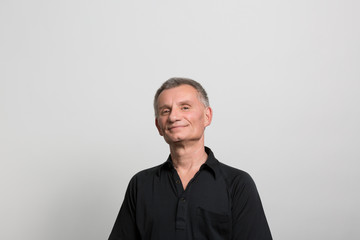 Obraz premium Studio portrait of a confident mature man