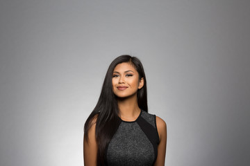 Obraz premium studio portrait of a confident young woman 
