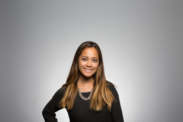 Obraz premium studio portrait of a happy young woman