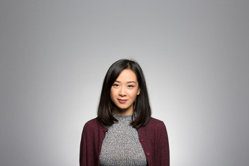 Fototapeta premium Studio portrait of a thoughtful young woman