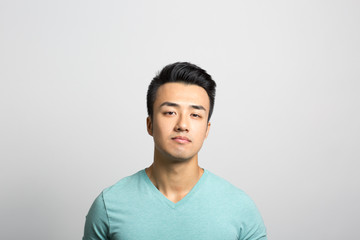 Fototapeta premium Studio portrait of a thoughtful young man