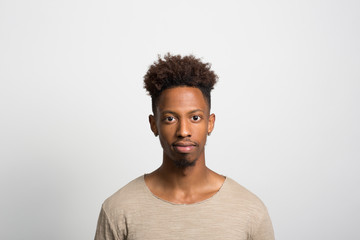 Obraz premium Studio portrait of a pensive young man 
