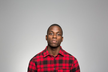 Obraz premium studio portrait of a young man contemplating