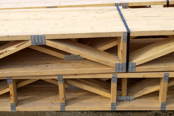 assembled beams construction site wood framework lumber stack