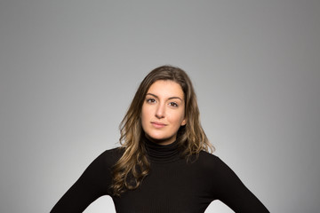 Obraz premium Studio portrait of a confident young woman
