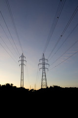 Electrical Hydro Towers and Cables at Sunset