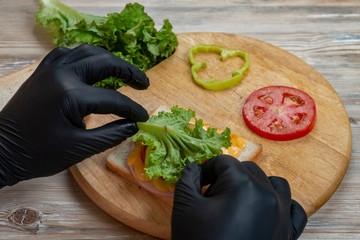 Process of cooking sandwich. variety of fillings and ingredients.Homemade Fast Food concept