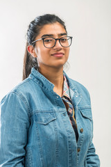 Portrait of a young confident teenager girl with spectacle