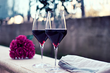 romantic drink with two glasses of red wine