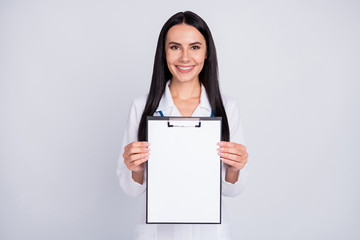 Photo of beautiful cheerful professional doc lady showing patient contract clinic insurance agreement wear stethoscope white lab coat isolated grey color background