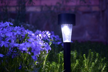 Lamp on the solar panel in the garden.