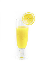 A glass of freshly squeezed lemon juice on a white background