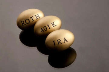 Gold nest eggs and coins concept for retirement, savings, and financial planning