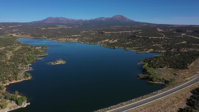 Aerial view of Recapture Reservoir in Utah state. Blue lake and mountains. USA country