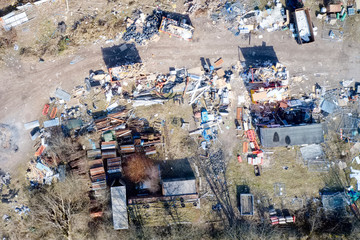 Aerial view of scrap yard container site of junk waste and rubbish