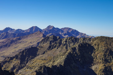 Panorama of the Pyrenees mountains in Andorra, from top of Coma Pedrosa peak.