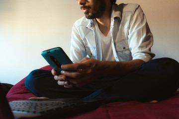 young freelancer working at home on a computer