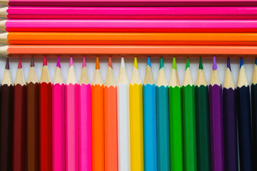 Bright Colored pencils arranged in a row with copy space.