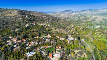 Aerial bird eye view of Miliou village hills and Akamas sea at Latchi, Paphos Cyprus. View of...