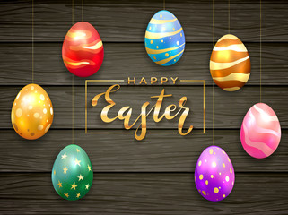 Colored Easter Eggs on Black Wooden Background