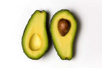 avocado two halves on a white background