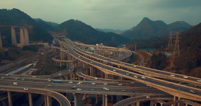 Drone 4K, aerial view of The most insane highway in all China, Qianchun interchange in the mountainous, Guiyang, China