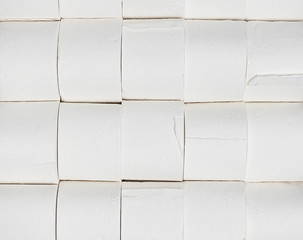 Toilet paper rools stacked on top of each other