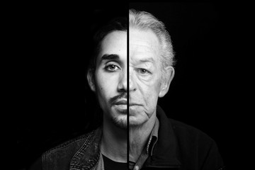 Beautiful man in front of a black background